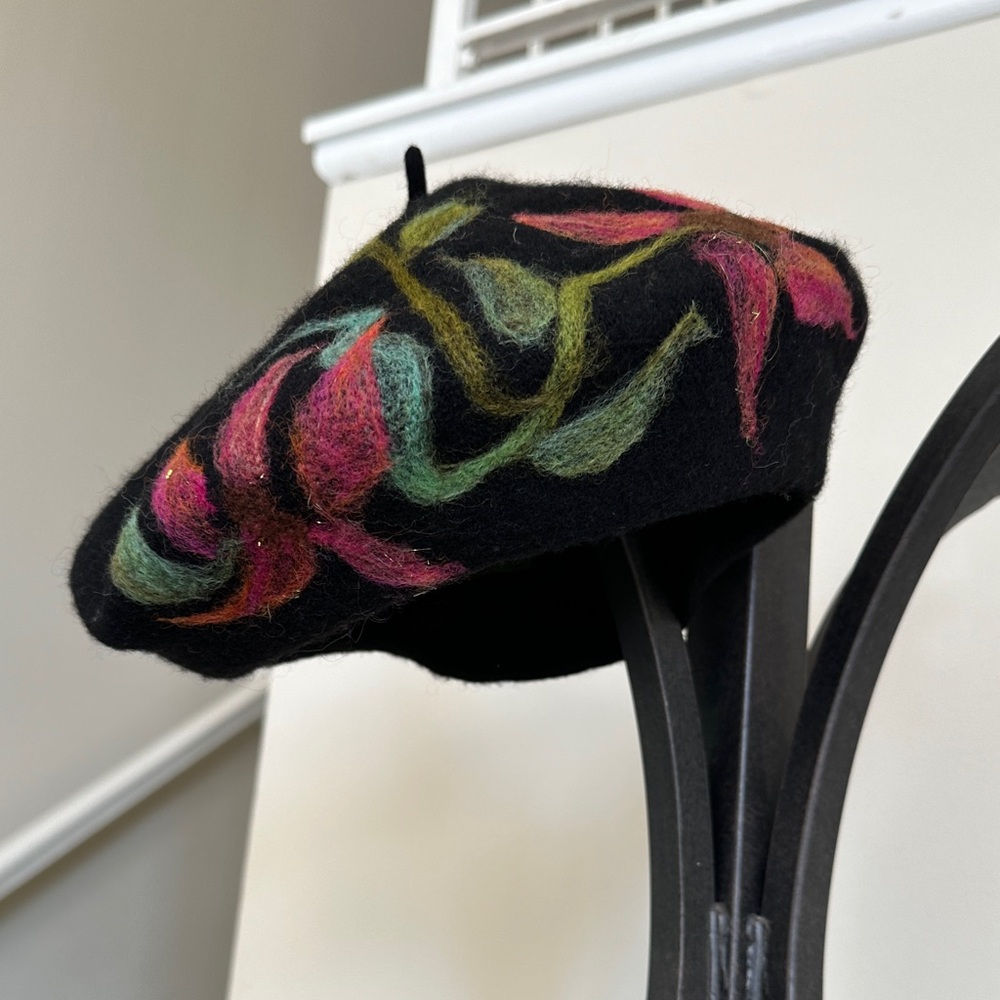 Black wool Beret with hand felted floral decoration in pink, aqua and green.